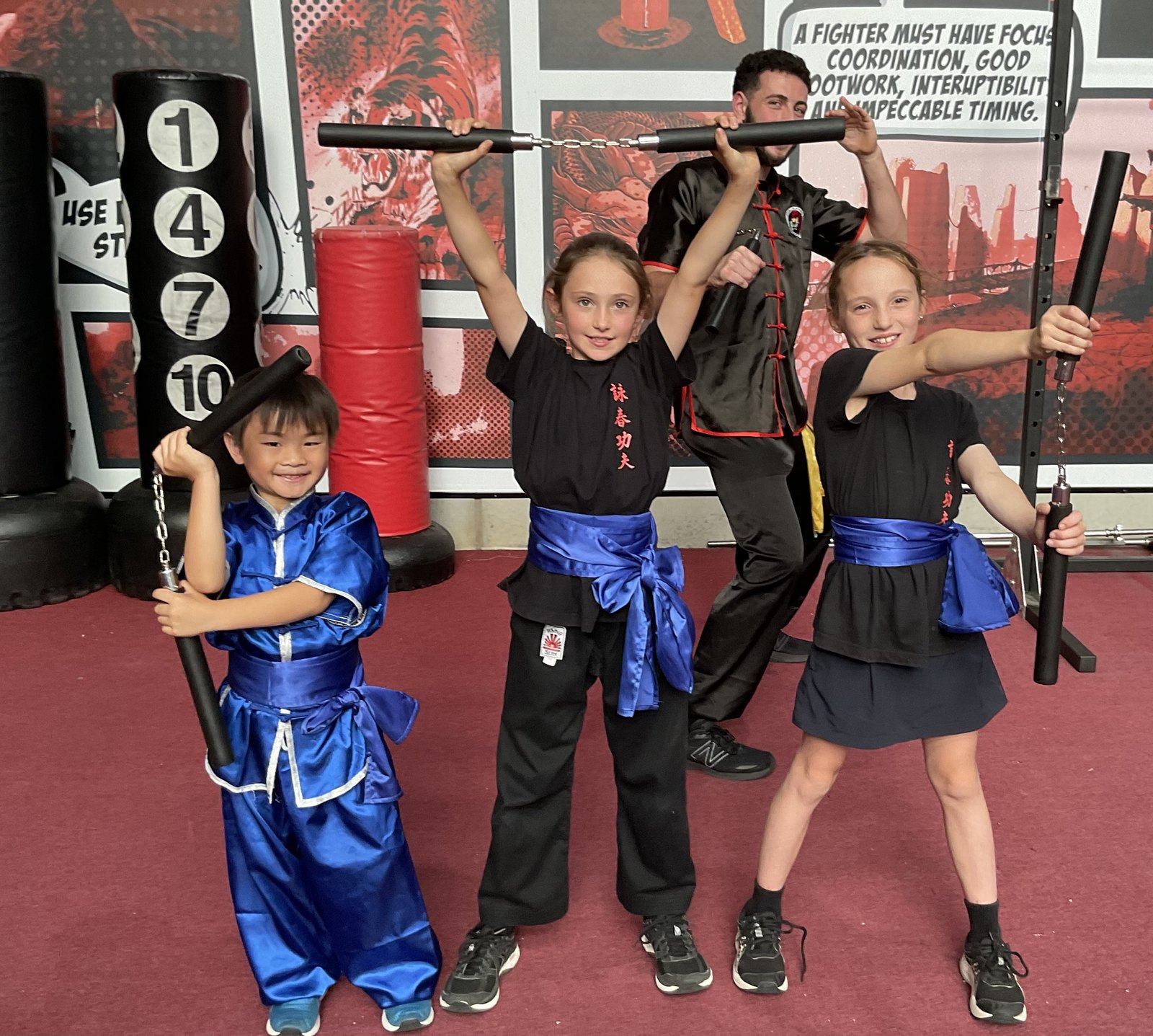 Children and instructors participating in a Wing Chun class